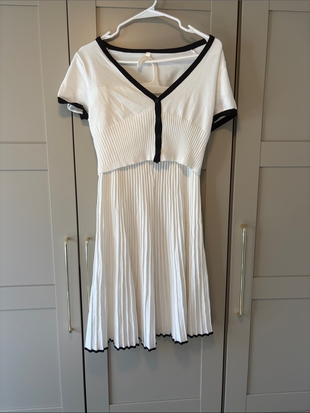 White V-Neck Button Front Pleated shirt and skirt set with Black Trim